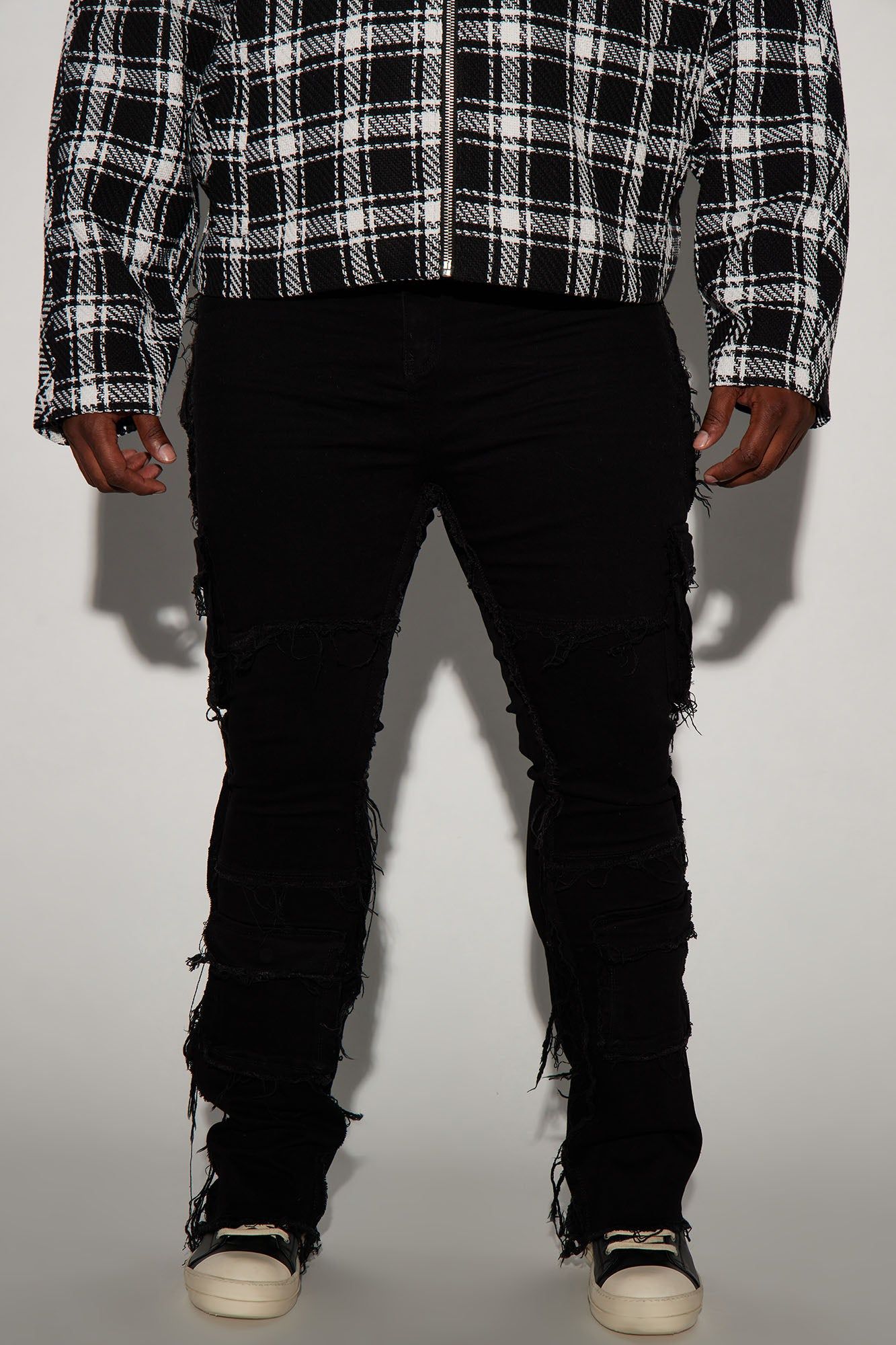 We Got This Fray Stacked Skinny Flare Jeans - Black sold by Fashion Nova