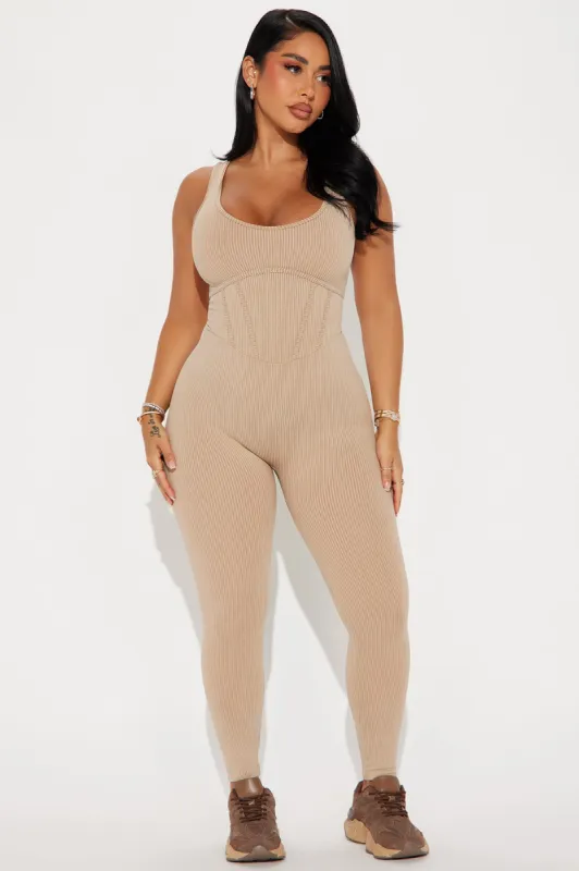 Lounge Era Jumpsuit - Mocha sold by Fashion Nova
