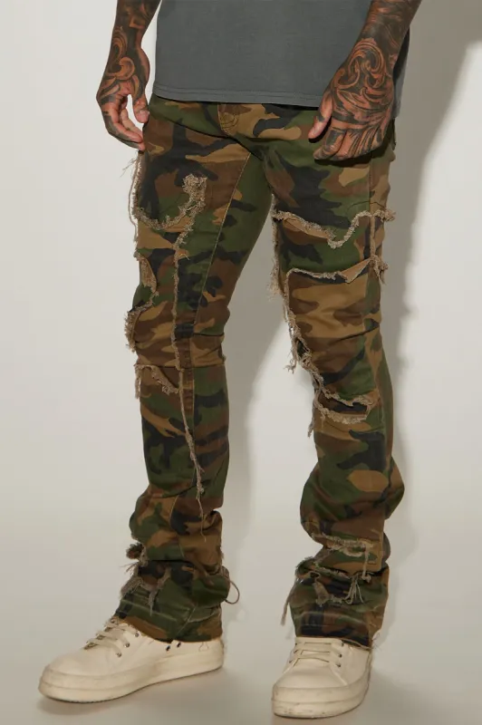 Coming Sideways Fray Stacked Skinny Flare Pants - Camouflage sold by Fashion Nova