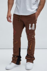 LA Scrap Art Sweatpant - Brown sold by Fashion Nova