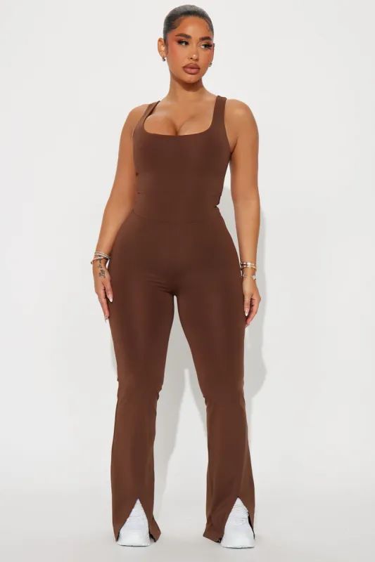 About The Gains Active Jumpsuit - Chocolate sold by Fashion Nova