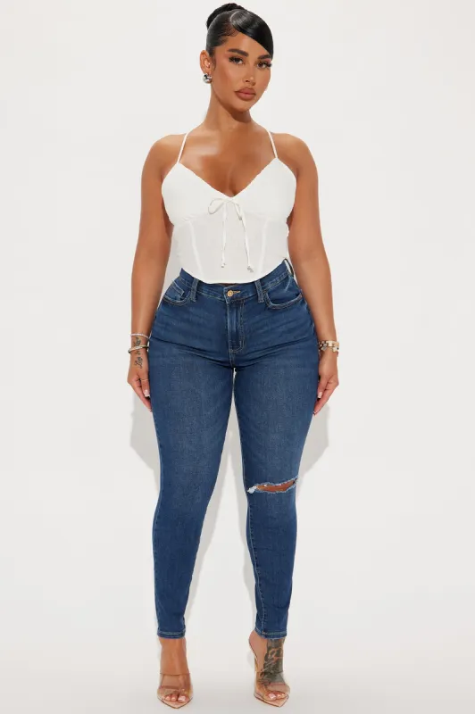 Trina Stretch Ripped Skinny Jeans - Dark Wash sold by Fashion Nova