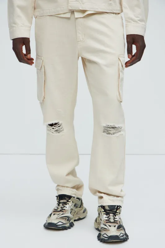 Benson Distressed Slim Cargo Pants - Cream sold by Fashion Nova