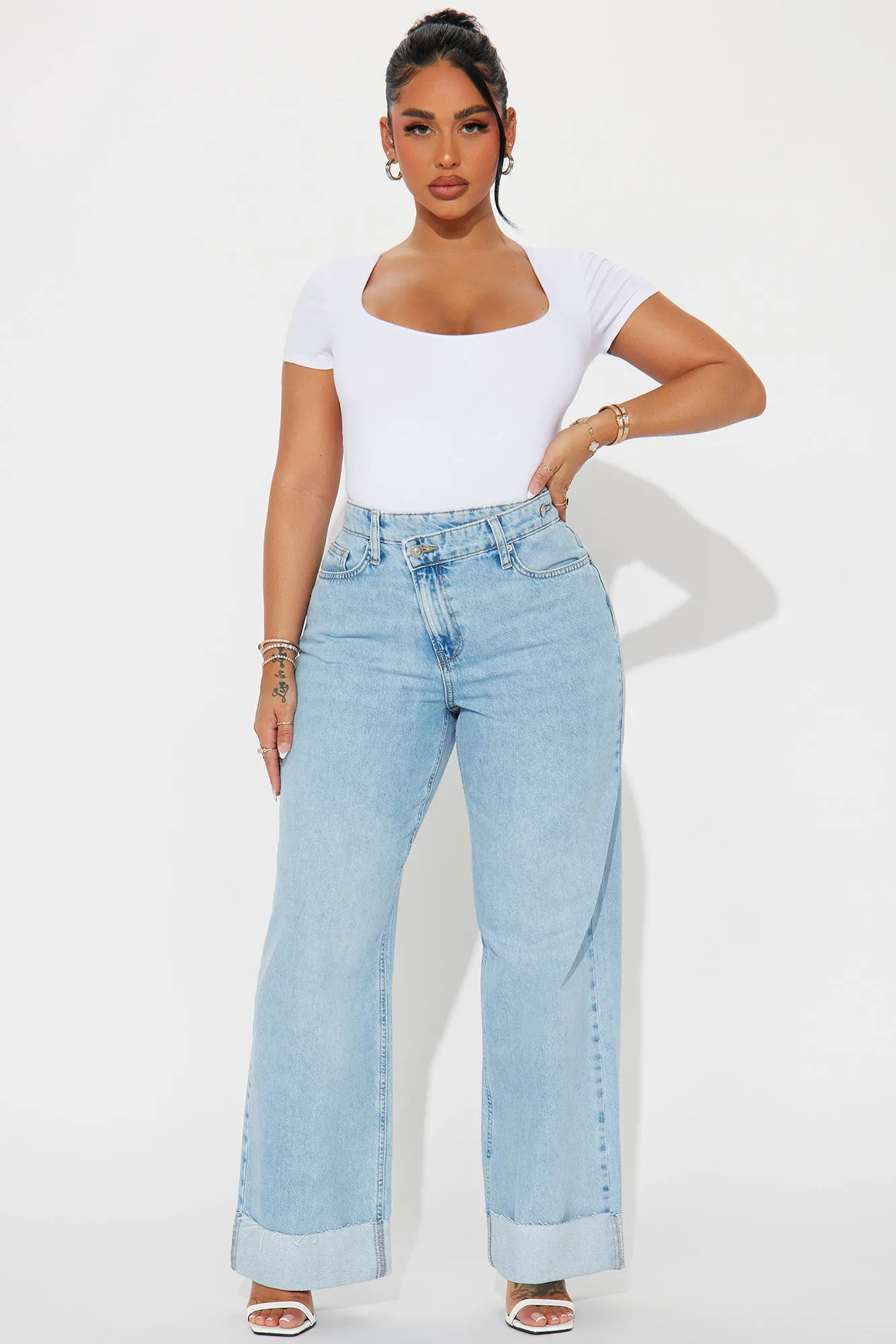 Getting Caught In It Crossover Cuffed Straight Leg Jeans - Light Wash sold by Fashion Nova product image thumbnail 2