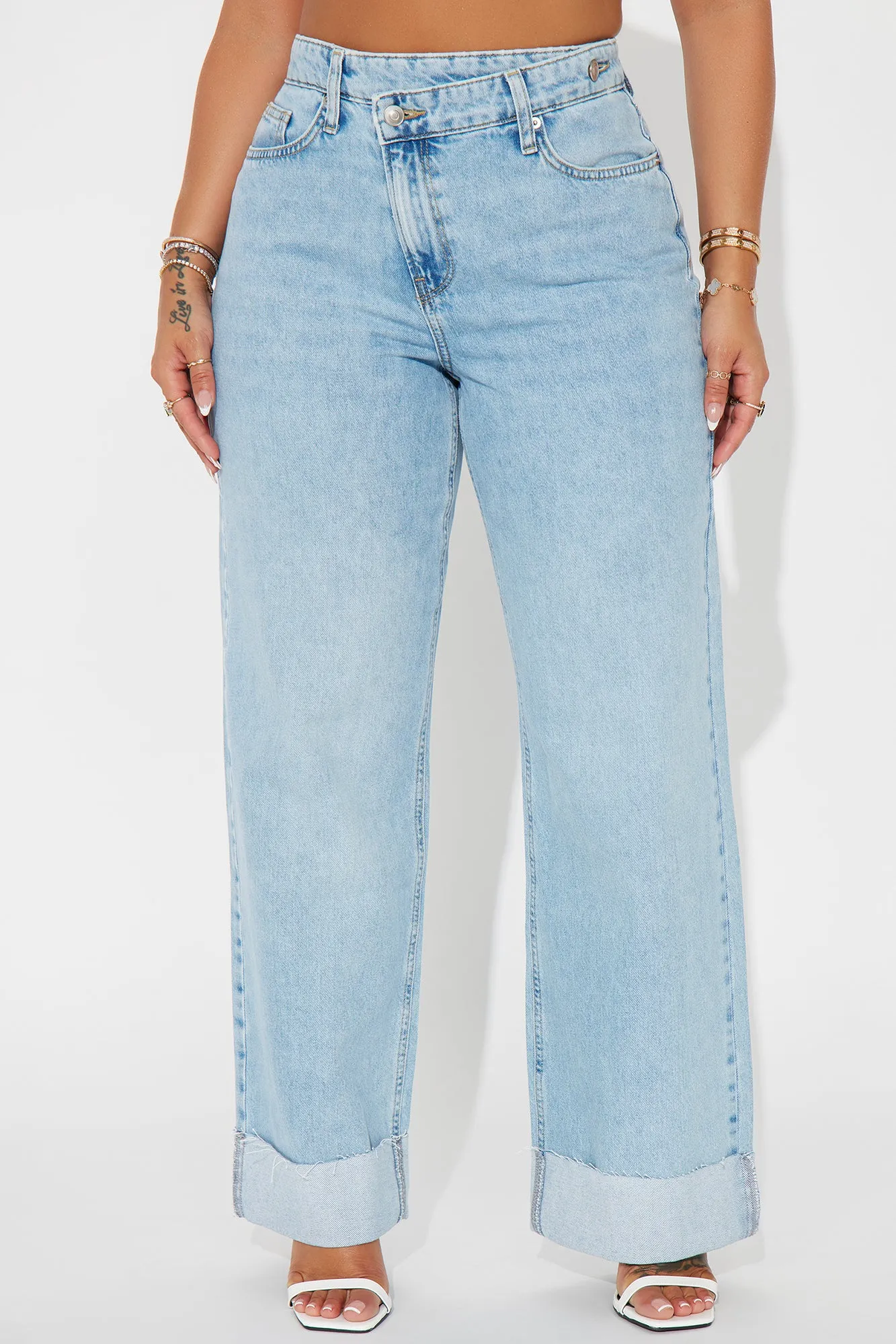 Getting Caught In It Crossover Cuffed Straight Leg Jeans - Light Wash sold by Fashion Nova