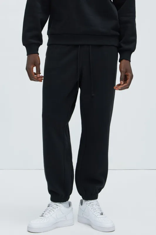 Tyson Relaxed Gusset Jogger - Black sold by Fashion Nova