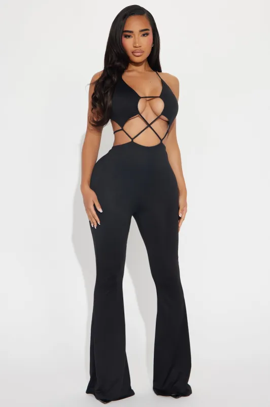 Out Of Sight Jumpsuit - Black sold by Fashion Nova