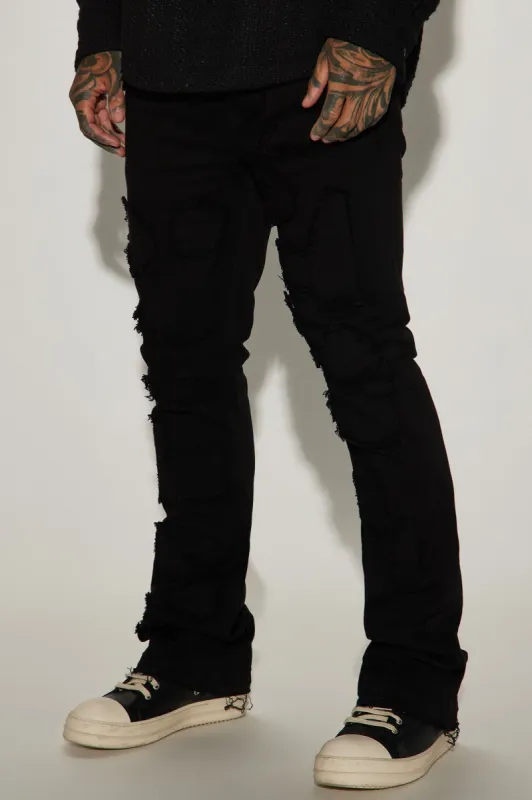 No Going Back Distressed Stacked Skinny Flare Pants - Black sold by Fashion Nova
