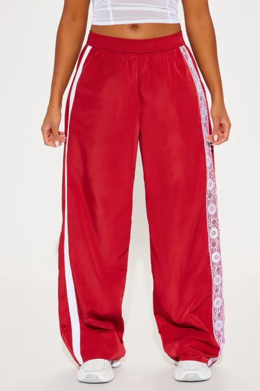 Keep Your Pace Track Pant - Burgundy sold by Fashion Nova