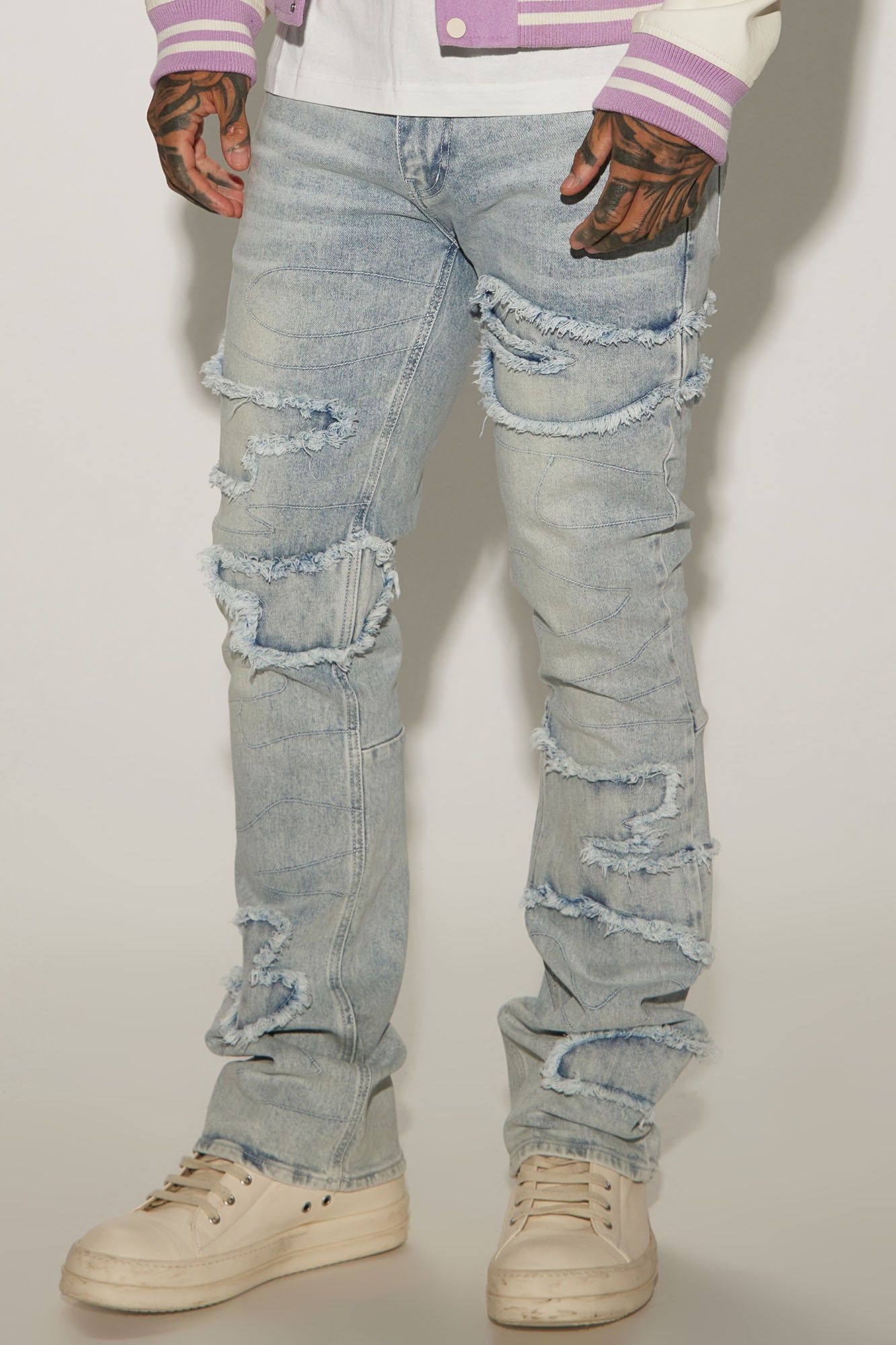 Shape It Fray Stacked Skinny Flare Jeans - Light Blue Wash sold by Fashion Nova