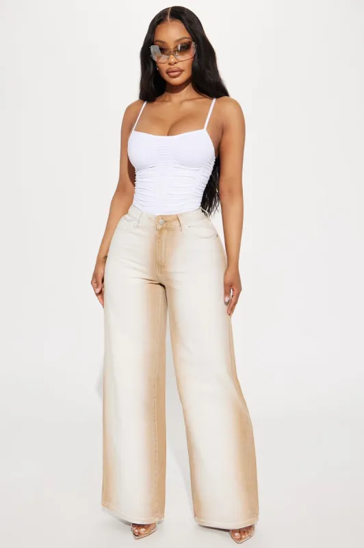 Getting Into It Baggy Jeans - Brown sold by Fashion Nova
