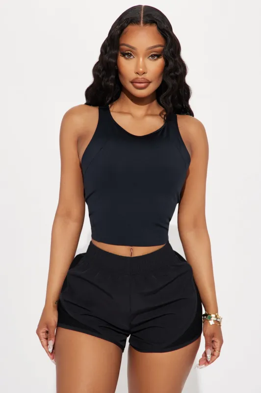 Track It Elevate Active Top - Black sold by Fashion Nova