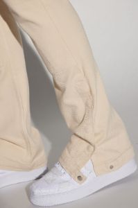 Indestructible Flared Carpenter Pants - Cream sold by Fashion Nova