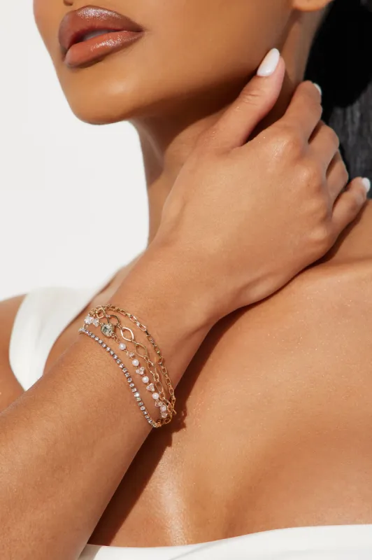 Heart Glow Multi Bracelet - Gold sold by Fashion Nova