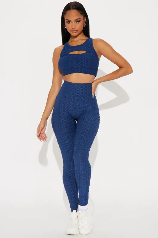 The Best Assets Textured Scrunch Butt Active Leggings - Navy sold by Fashion Nova