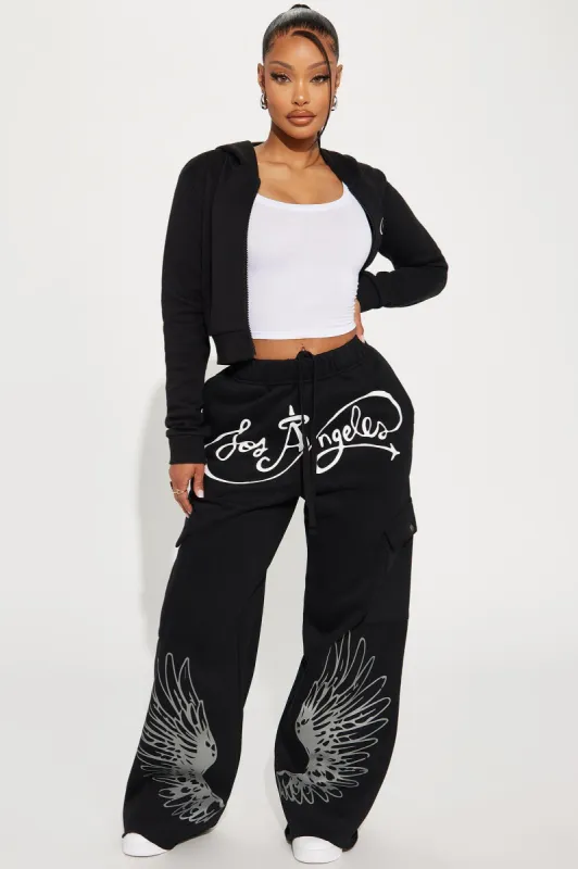 Spread Your Wings Cargo Wide Leg Pant - Black sold by Fashion Nova