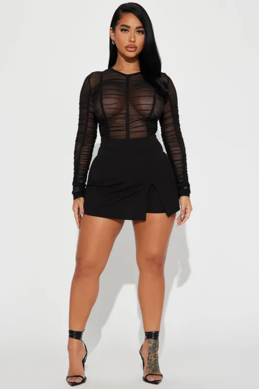 Heart Of The City Mesh Romper - Black sold by Fashion Nova