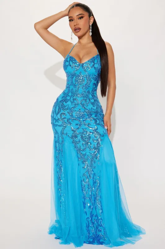 A Statement Sequin Maxi Gown - Blue sold by Fashion Nova