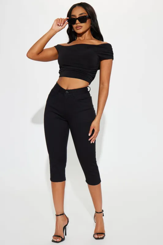 Iconic Capri Uniform Pant - Black sold by Fashion Nova