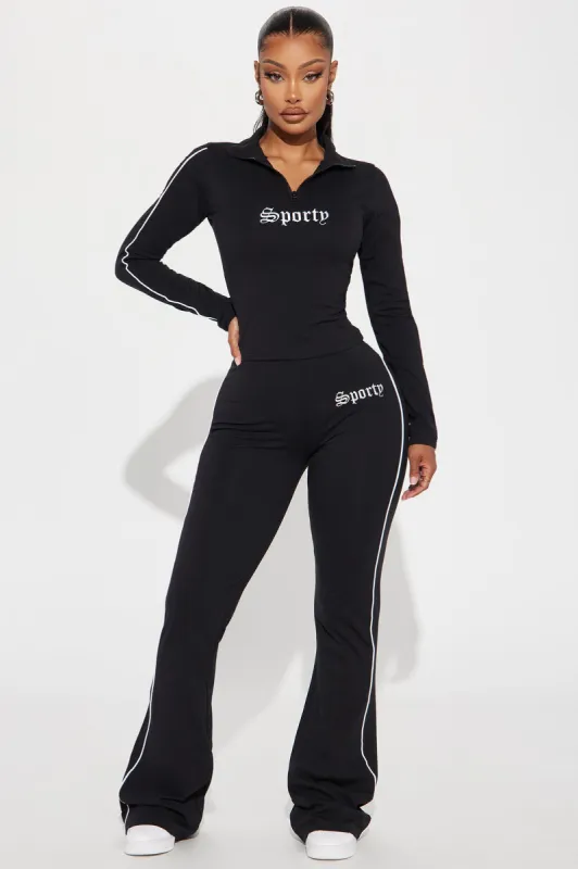 Sporty Girl Embroidered Flare Pants - Black/White sold by Fashion Nova