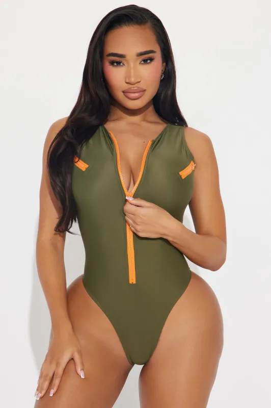 Jetting Off Zip Up 1 Piece Swimsuit - Olive sold by Fashion Nova