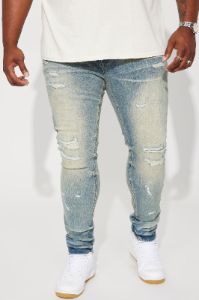 Street Rising Ripped Stacked Skinny Jeans - Medium Wash sold by Fashion Nova