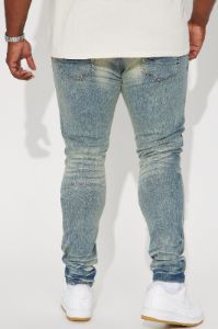 Street Rising Ripped Stacked Skinny Jeans - Medium Wash sold by Fashion Nova
