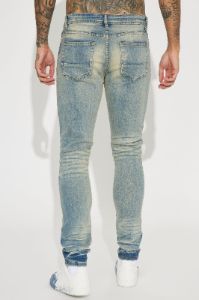 Street Rising Ripped Stacked Skinny Jeans - Medium Wash sold by Fashion Nova