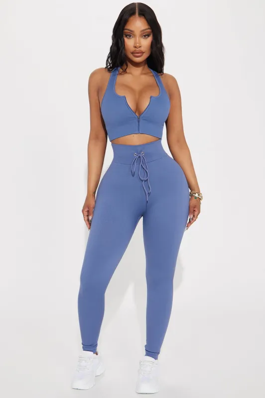 Feel The Burn Sports Bra - Slate Blue sold by Fashion Nova