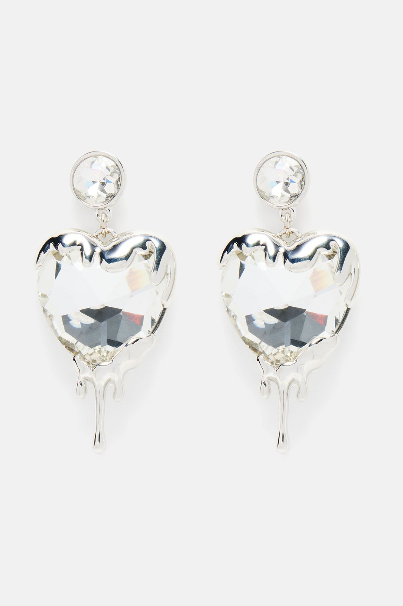Bleeding Love Earrings - Silver sold by Fashion Nova