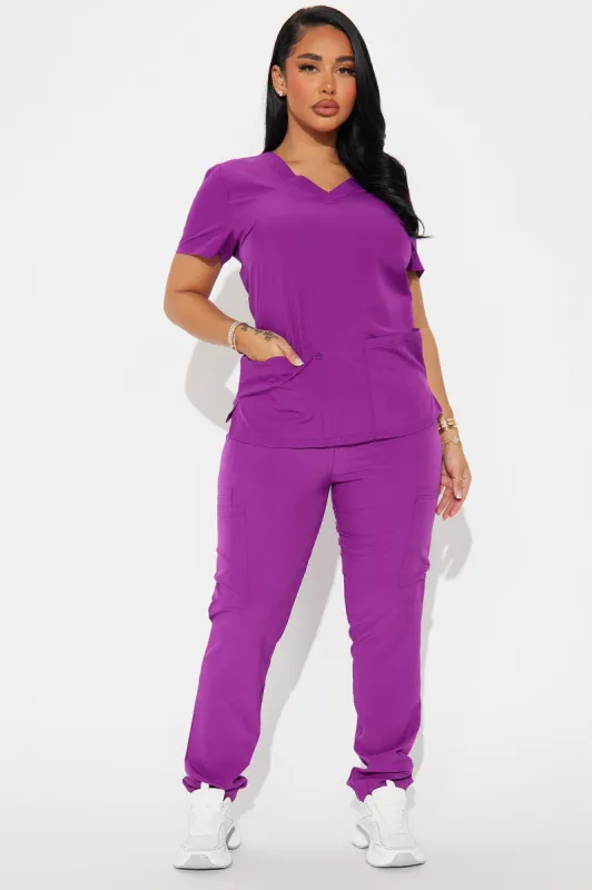 On Call Jogger Stretch Uniform Scrub Set - Purple sold by Fashion Nova