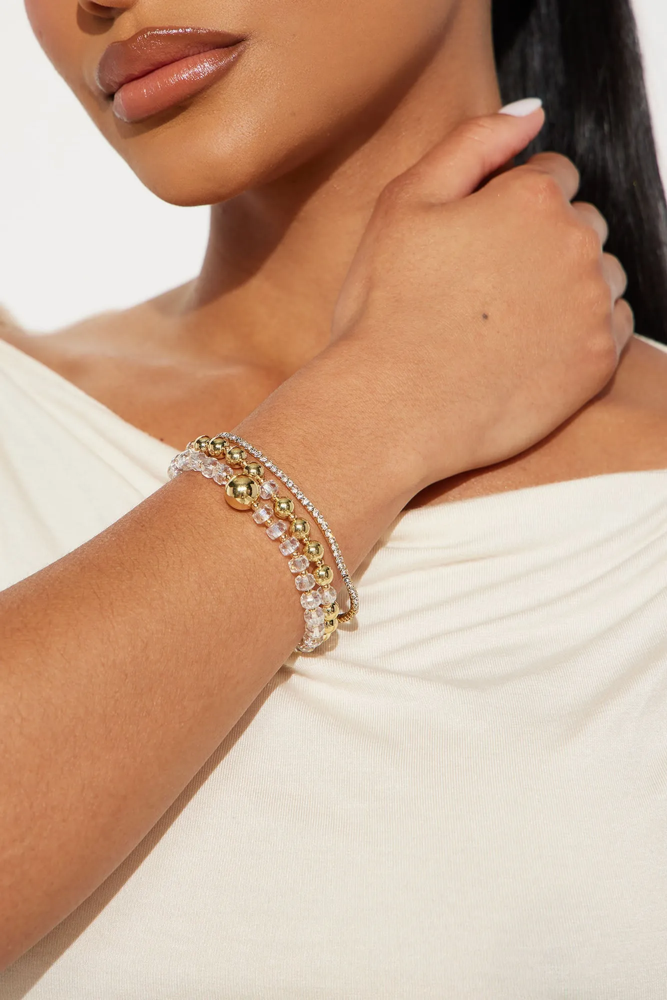 Sun Glow 3 Piece Bracelet Set - Clear/Gold sold by Fashion Nova