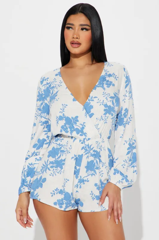 Make It Shine Floral Romper - White/Blue sold by Fashion Nova
