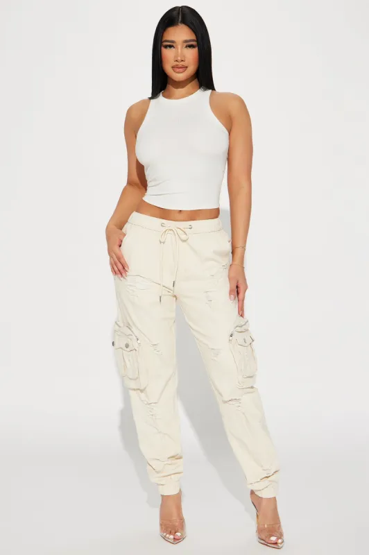 Who's That Girl Distressed Cargo Jogger - Ivory sold by Fashion Nova