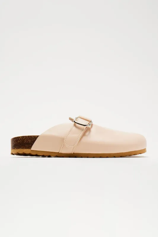 Ferrara Mules - Nude sold by Fashion Nova