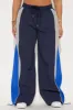 Taking Off Windbreaker Track Pant - Navy/combo sold by Fashion Nova