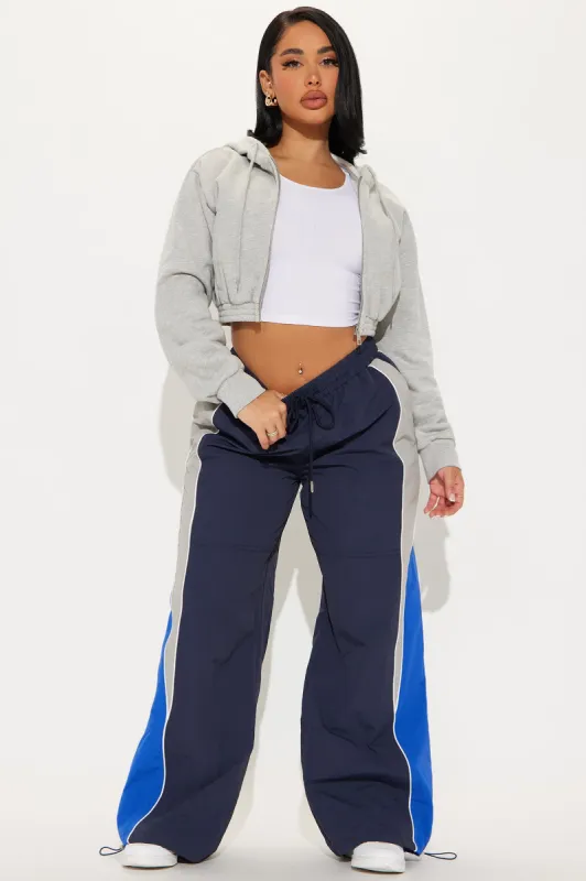 Taking Off Windbreaker Track Pant - Navy/combo sold by Fashion Nova