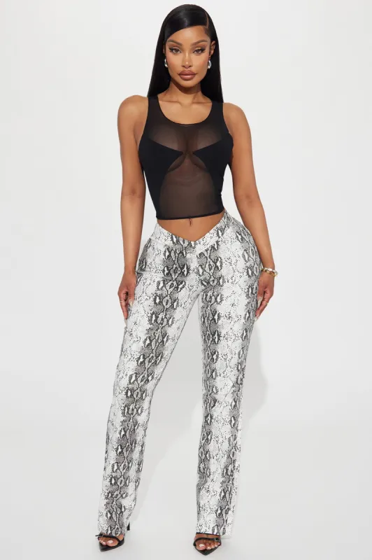I Won't Bite Low Rise Pant - Black/combo sold by Fashion Nova