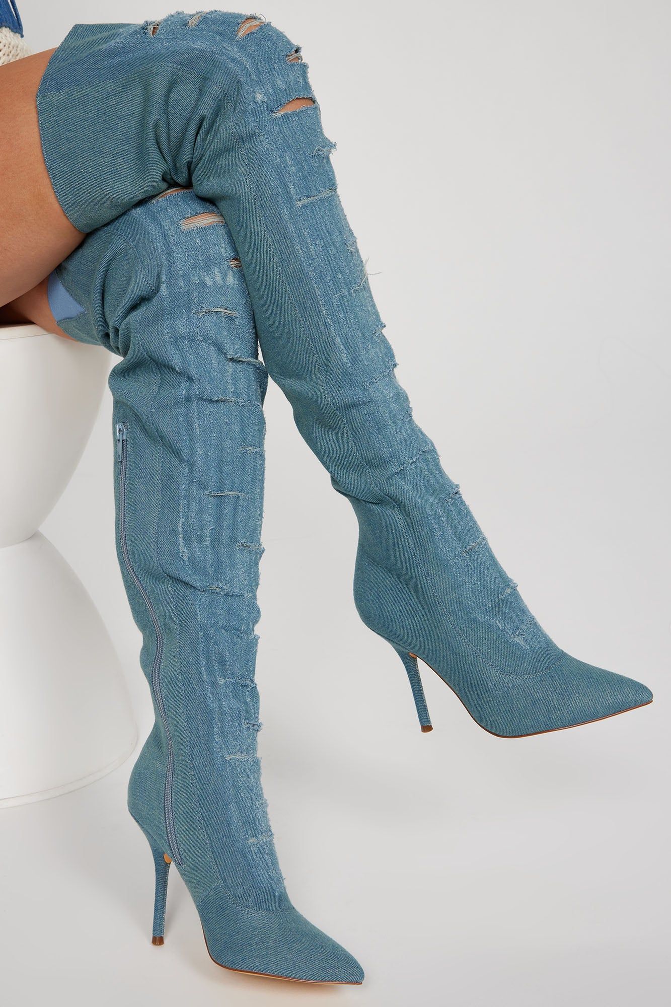 Leighton Distressed Denim Boots - Light Wash sold by Fashion Nova