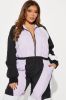 First Place Windbreaker Jumpsuit - Purple/combo sold by Fashion Nova