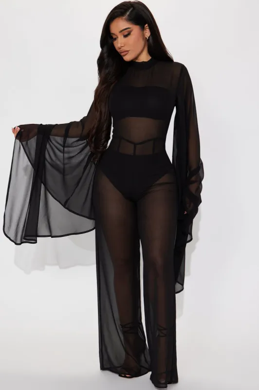About Mines Jumpsuit - Black sold by Fashion Nova