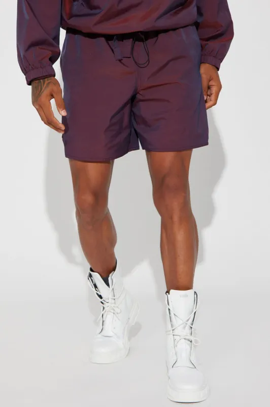 Stormy Iridescent Nylon Shorts - Burgundy sold by Fashion Nova