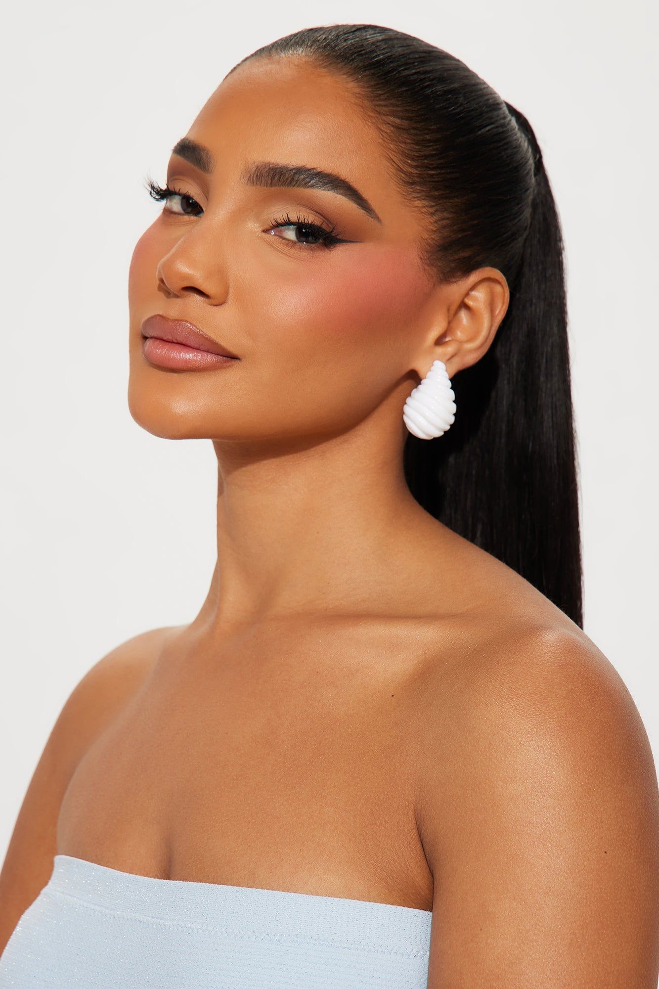 Bombshell Earrings - White sold by Fashion Nova