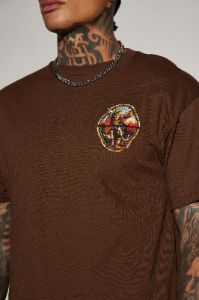 The Archangel Stained Glass Short Sleeve Tee - Chocolate sold by Fashion Nova