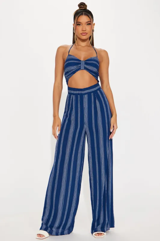 Chasing Islands Jumpsuit - Navy sold by Fashion Nova