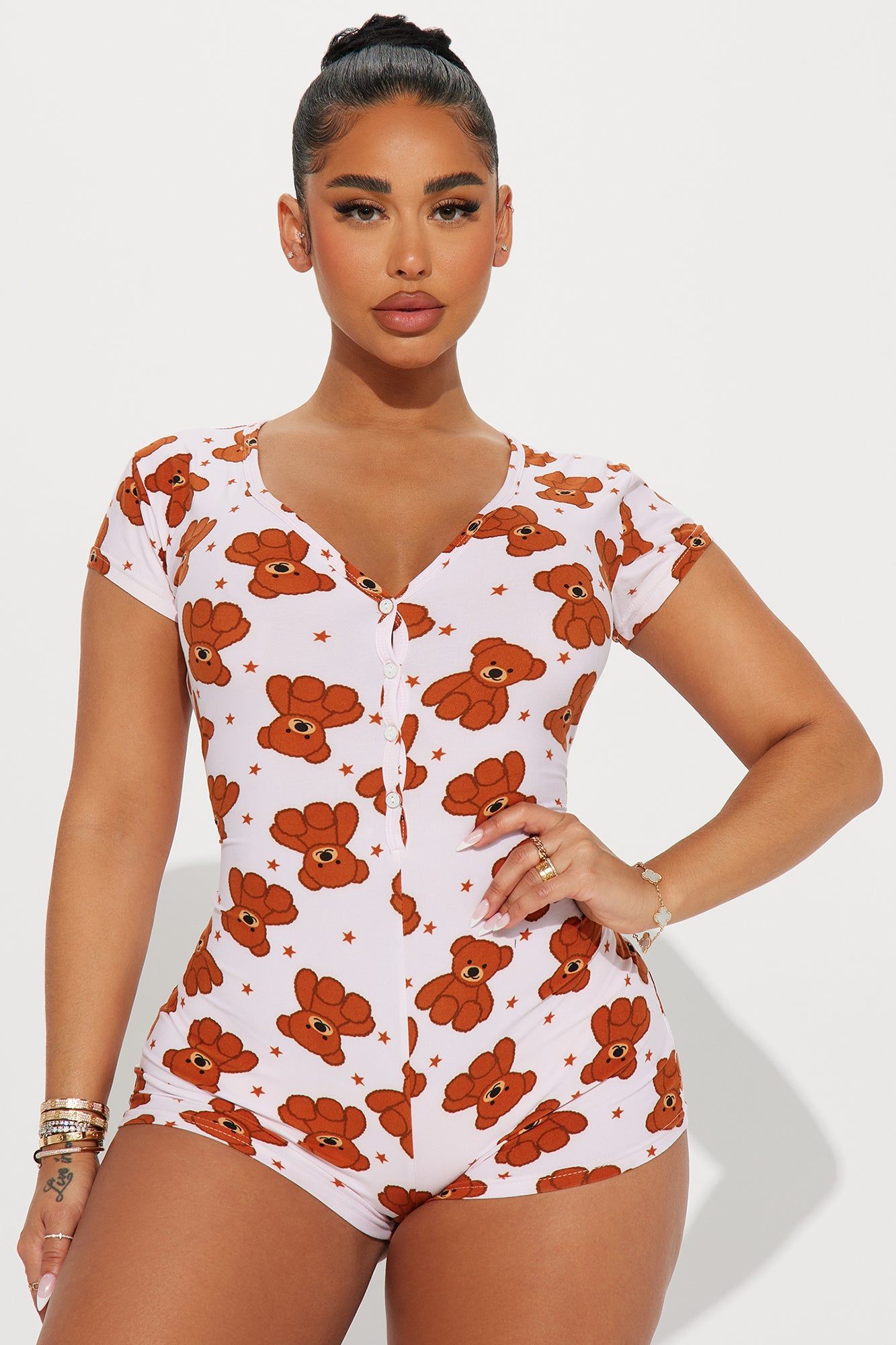 Too Cute To Care PJ Romper Onesie - Brown/combo sold by Fashion Nova