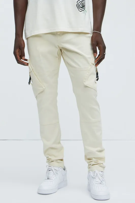 Hayes Stacked Skinny Cargo Pants - Cream sold by Fashion Nova