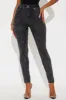 Standing On Business Skinny Jeans - Black Wash sold by Fashion Nova
