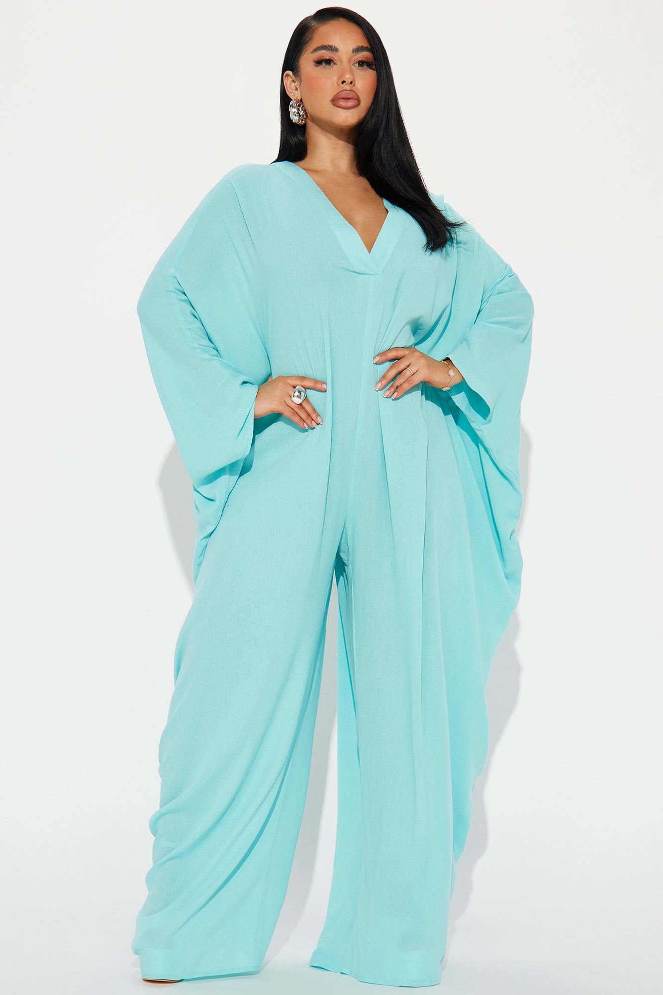 Lilah Jumpsuit - Aqua sold by Fashion Nova