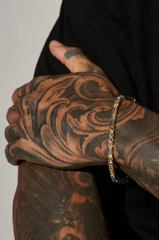 Baguette And Tennis Chain Bracelet - Gold made by Fashion Nova